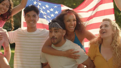 Tracking-Shot-Orbiting-Around-Group-of-Young-Americans-Smiling-and-Celebrating