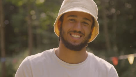 Portrait-Shot-of-Young-Man-Posing-and-Smiling