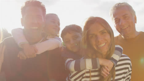 Low-Angle-Shot-of-Children-Piggy-Backing-On-Their-Parents-02