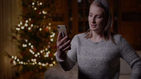 Positive-Woman-Video-Chatting-Christmas-Smartphone-4