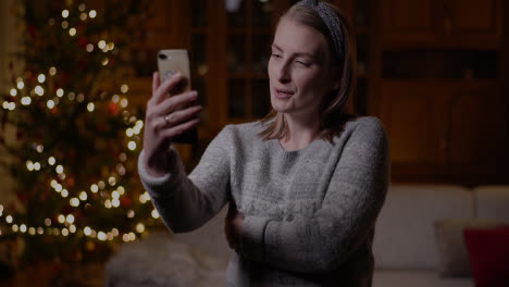 Positive-Woman-Video-Chatting-Christmas-Smartphone-5