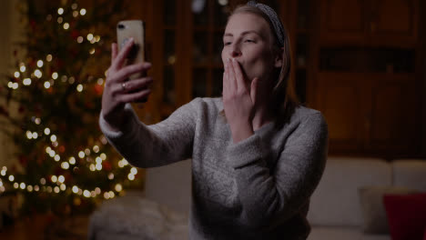 Positive-Woman-Video-Chatting-Christmas-Smartphone-6