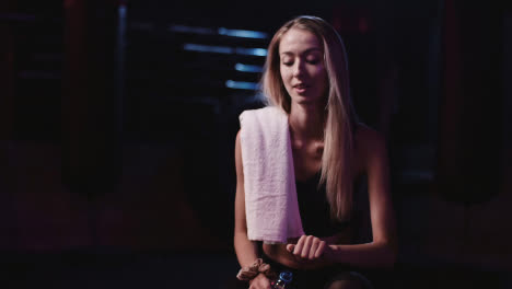Slow-Motion-Of-Young-Athletic-Woman-Drinking-Water-From-Bottle-In-Gym