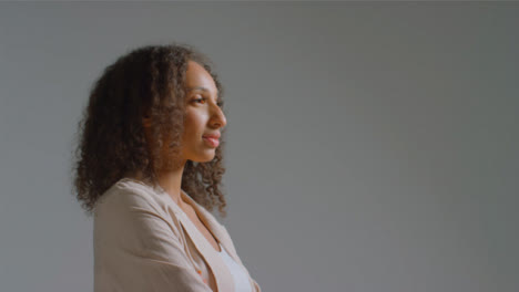 Side-Profile-Shot-of-Young-Adult-Woman-Looking-Neutral-Off-Camera