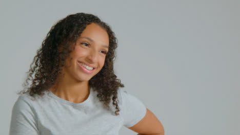 Portrait-Shot-of-Young-Adult-Woman-Smiling-Off-Camera-with-Copy-Space-03