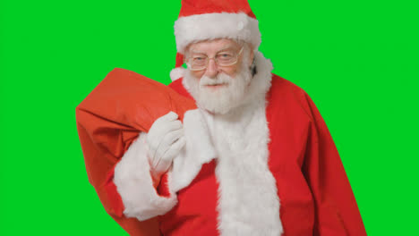Portrait-Shot-of-Santa-Carrying-Sack-with-Green-Screen
