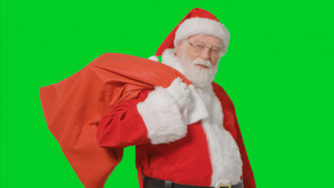 Portrait-Shot-of-Santa-Holding-Sack-with-Green-Screen-