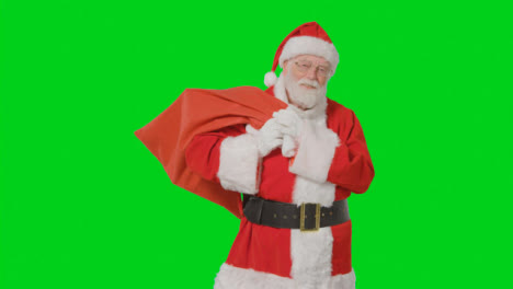 Portrait-Shot-of-Santa-Holding-Sack-with-Green-Screen