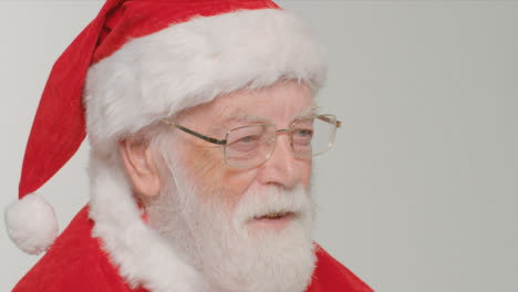 Close-Up-Shot-of-Santa-Looking-Off-Camera