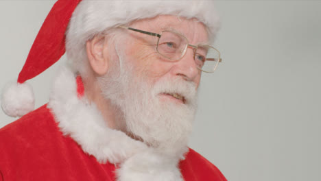 Close-Up-Shot-of-Santa-Claus-Looking-Off-Camera