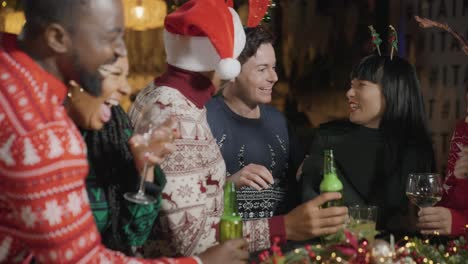 Medium-Shot-of-Drunk-Man-with-His-Friends-During-Christmas-Celebrations-at-a-Bar