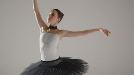 Wide-Shot-of-Ballet-Dancer-Dancing-Away-from-The-Camera-in-Black-Tutu