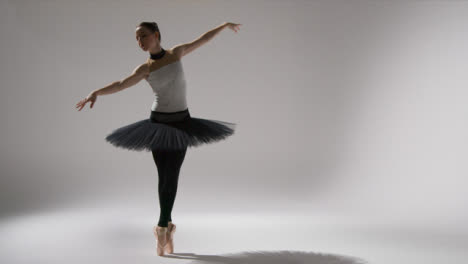 Wide-Shot-of-a-Ballerina-on-Pointe-with-Copy-Space