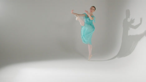 Wide-Shot-of-Young-Ballet-Dancer-Dancing-in-Blue-Dress