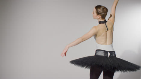 Mid-Shot-of-the-Back-of-a-Ballet-Dancer-Dancing