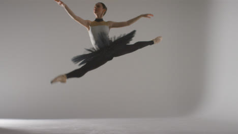 Wide-Shot-of-Ballet-Dancer-Jumping-and-Dancing