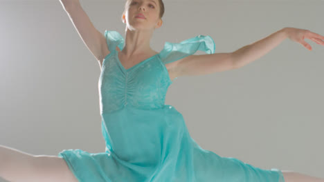 Mid-Shot-of-Ballet-Dancer-Jumping-Through-the-Frame