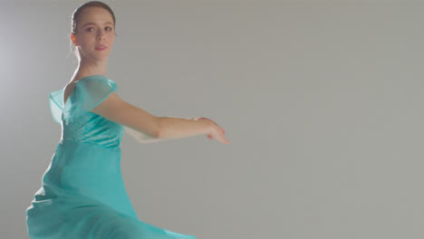 Mid-Shot-of-Ballet-Dancer-Twirling-with-Copy-Space