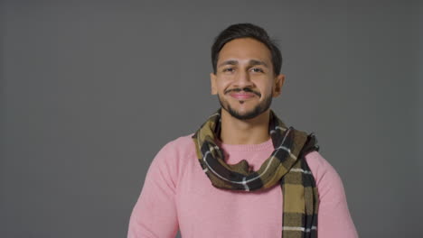 Portrait-Shot-of-Young-Man-Smiling-to-Camera-