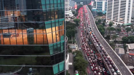 Drone-Shot-Revealing-Traffic-On-a-Jakarta-Highway