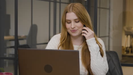 Tracking-Shot-of-a-Young-Woman-Speaking-on-Phone