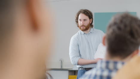Over-the-Shoulder-Shot-of-Engineering-Teacher-Talking-to-His-Class-02