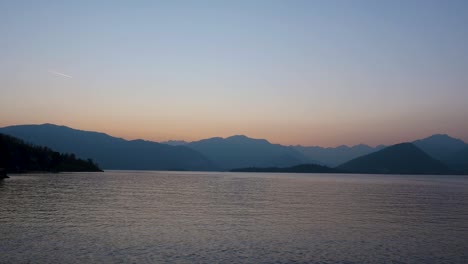 View-of-Lake-with-Mountains-in-Italy-at-Dusk