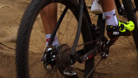 Close-Up-Bike-Passing-on-Dirt-Track