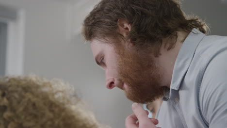 Close-Up-Shot-of-Engineering-Teacher-Observing-His-Students-01