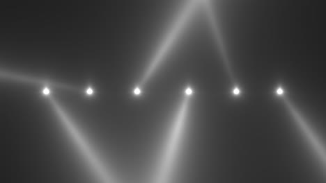 Leuchtend-Weiße-Scheinwerferstrahlen-Auf-Der-Bühne