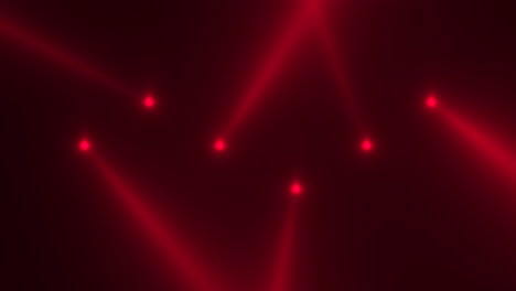 Leuchtend-Rote-Scheinwerferstrahlen-Auf-Der-Bühne