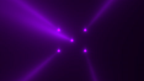 Glowing-purple-spotlight-beams-on-stage
