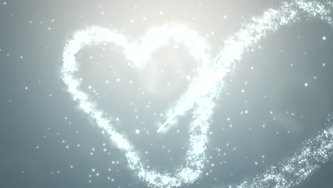 White-heart-with-white-glitters-on-blue-sky
