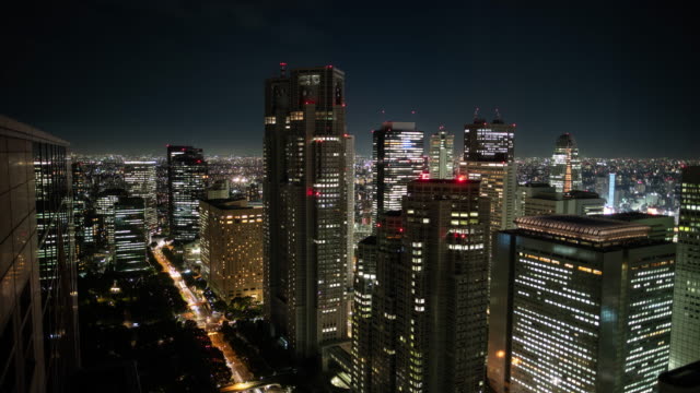 Time-Lapse-Shot-of-the-Cityscape.-Big-City-with-Skyscrapers,-Busy-Traffic-and-Night-Lights.-Skyline
