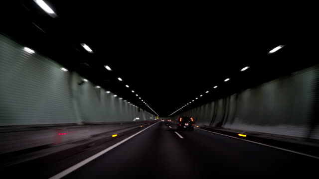 driving-in-the-dark-tunnel
