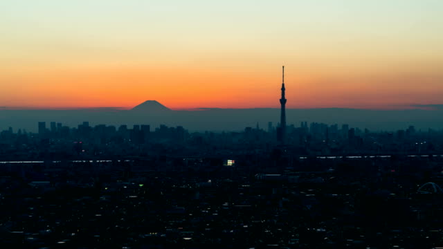 Tiempo-transcurrido-Skyline-de-Tokyo-y-Fuji-montaña-de-día-hasta-el-ocaso-de-la-noche