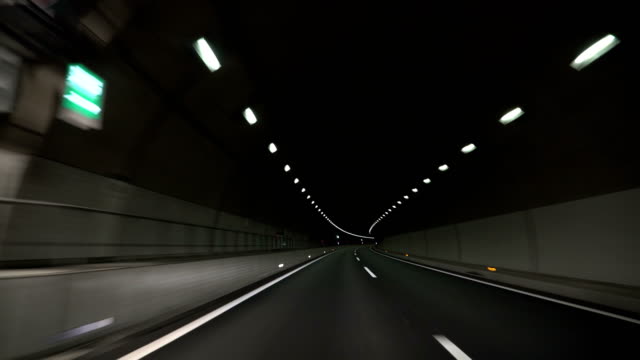 driving-in-the-dark-tunnel