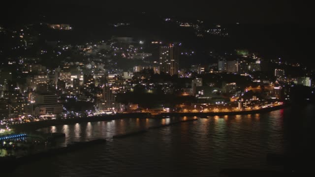 Night-view-of-Atami-hot-spring-city---Pan-right-to-left