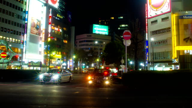 Night-lapse-4K-in-front-of-Ikebukuro-station-east-side-deep-focus-right-panning