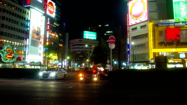 Night-lapse-4K-in-front-of-Ikebukuro-station-east-side-deep-focus-tilt-up