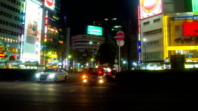 Night-lapse-4K-in-front-of-Ikebukuro-station-east-side-wide-shot-zoom-out