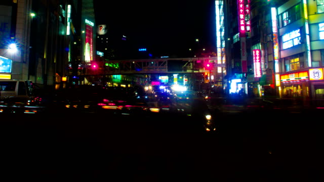 Night-lapse-at-Shinjuku-south-side-4K-wide-shot-left-panning