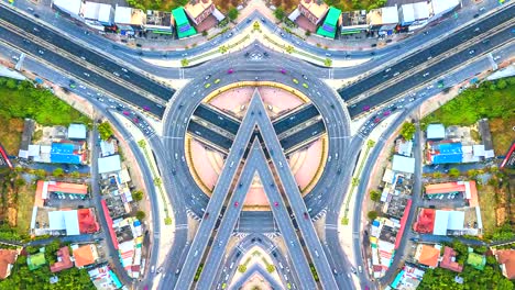 Aerial-view-Time-lapse-traffic-in-expressway,-motorway-and-highway-in-the-detail-of-circus-intersection