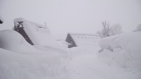 The-traditionally-thatched-houses-in-Shirakawa-go-where-is-the-mountain-village-among-the-snow-near-Gifu,-Ishikawa,-and-Toyama-prefecture-in-the-winter,-Japan