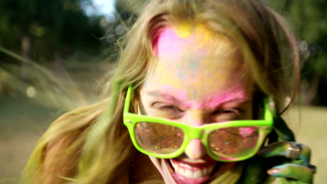 Close-up-Face-Shot-of-Girl-Covered-in-Holi-Powder