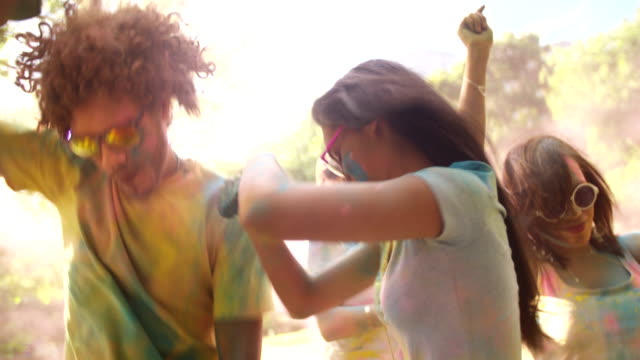 Friends-Throwing-Holi-Powder-at-Each-Other