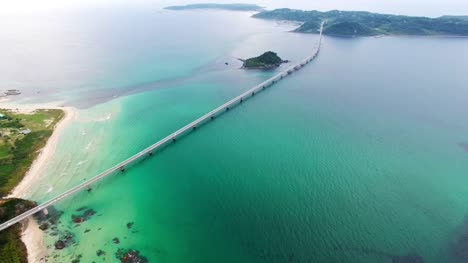 Aerial-shot-of-bridge-spanning-island