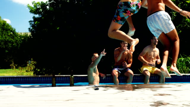 Friends-jumping-in-the-swimming-pool