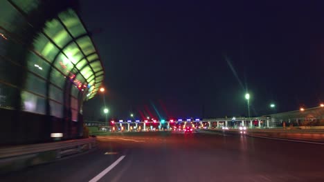 Night-highway-drive---Automatic-toll-collection-gate.-"ETC"-Niiza-toll-gate.
