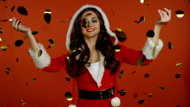 Santa-Claus-girl-enjoying-with-confetti
